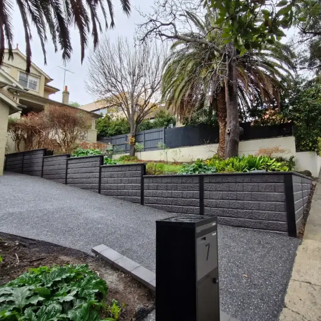Retaining wall built alongside a Melbourne driveway