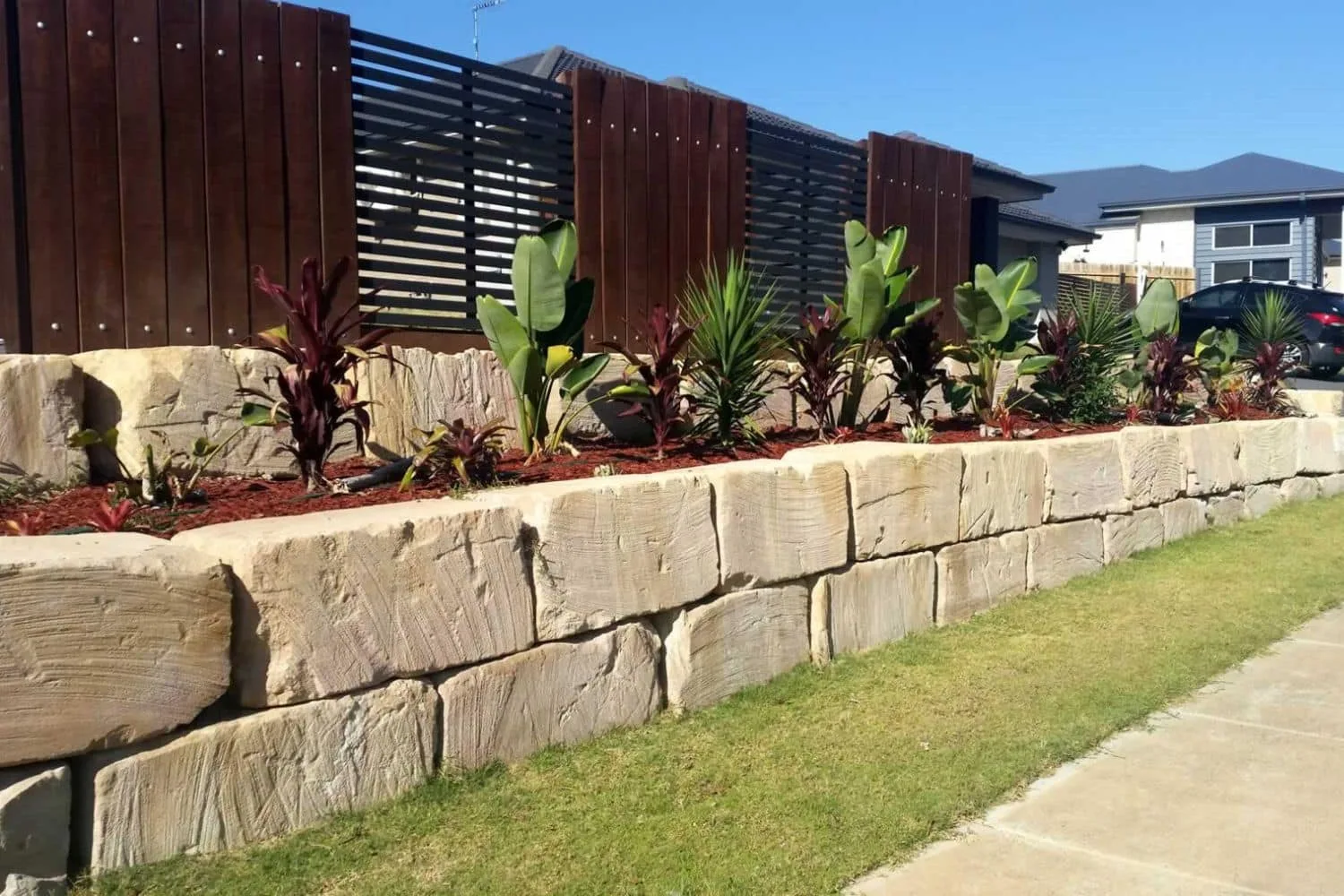 Sandstone retaining wall in a Melbourne garden